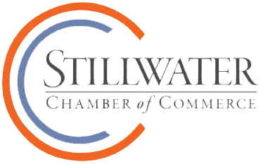 Stillwater Chamber of Commerce logo with orange and blue curved lines around the text. -JRPMTS